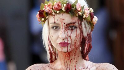 Picture tagged with: Blonde, Eyes, Face, Femen, Ukrainian