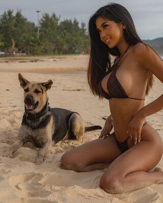 Picture tagged with: Skinny, Asian, LittleThingsMingle, Beach, Bikini, Cute, Dog, Smiling
