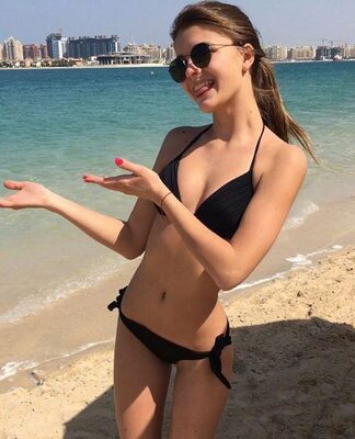 Picture tagged with: Skinny, Brunette, Darya Komarova, Beach, Bikini, Cute, Smiling, Tongue, Ukrainian