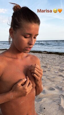 Picture tagged with: Skinny, Brunette, Marisa Papen, Beach, Belgian, Cute, Shy, Small Tits