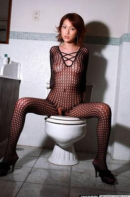 Picture tagged with: Asian, Eyes, Boobs, Fishnet, Tummy