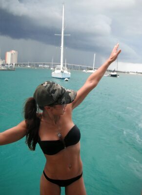 Picture tagged with: Belgian, Bikini, Boat, Brunette, Natacha Nies-Piotrowski, Piercing, Cute, Tummy