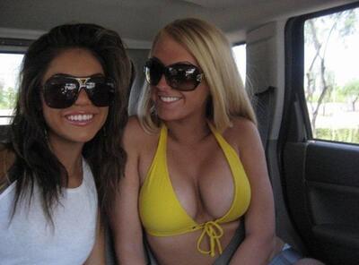 Picture tagged with: Blonde, Brunette, 2 girls, Car, Smiling