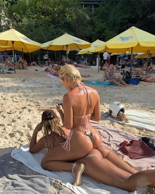 Picture tagged with: Blonde, Mathilde Tantot, 2 girls, Ass - Butt, Beach, Bikini, French, Legs