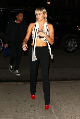 Picture tagged with: American, Blonde, Miley Cyrus, Celebrity - Star, Small Tits, Tattoo, Tummy