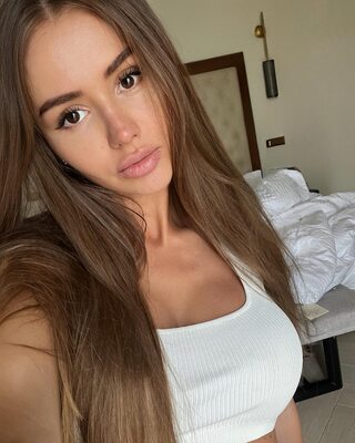 Picture tagged with: Brunette, Busty, Valentina Grishko - Valenti Vitell, Cute, Eyes, Russian, Selfie