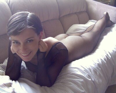 Picture tagged with: Brunette, Fishnet, Smiling
