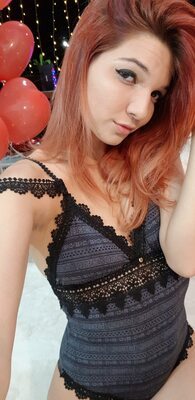 Picture tagged with: Camgirl, Chaturbate, Jessy loollypop, Redhead, Lingerie