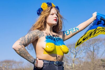 Picture tagged with: Redhead, Body painting, Boobs, Femen, Sexy Wallpaper, Tattoo, Ukrainian