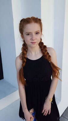 Picture tagged with: Redhead, Braid, Eyes, Safe for work