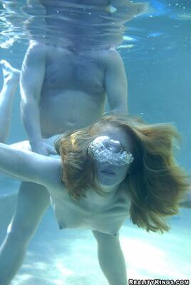 Picture tagged with: Redhead, Doggy style, Pool, Under water