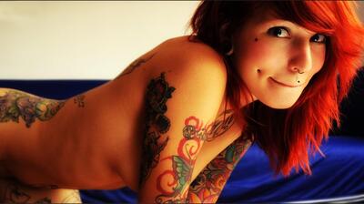 Picture tagged with: Redhead, Piercing, Tattoo