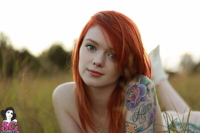 Picture tagged with: Redhead, Tattoo