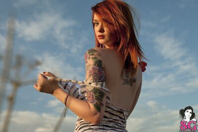 Picture tagged with: Redhead, Tattoo