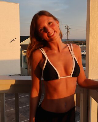 Picture tagged with: Skinny, Blonde, Ella Grace Jones, American, Bikini, Cute, Eyes, Smiling, Tummy