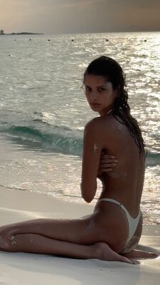 Picture tagged with: Skinny, Bruna Lírio, Brunette, Beach, Bikini, Brazilian, Celebrity - Star, Cute, Eyes, Legs, Monokini, Shy