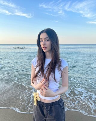 Picture tagged with: Skinny, Brunette, Dasha Taran, Beach, Cute, Russian, Safe for work