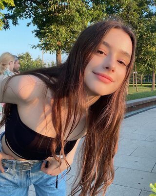 Picture tagged with: Skinny, Brunette, Dasha Taran, Cute, Russian, Safe for work, Smiling