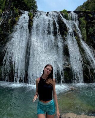 Picture tagged with: Skinny, Brunette, Delfina Suarez Luco, Argentinean, Cute, Nature, Smiling, Waterfall