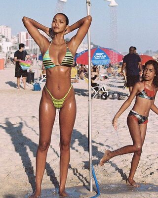 Picture tagged with: Skinny, Brunette, Lais Ribeiro, 2 girls, Beach, Bikini, Brazilian, Celebrity - Star, Legs, Shower, Tummy