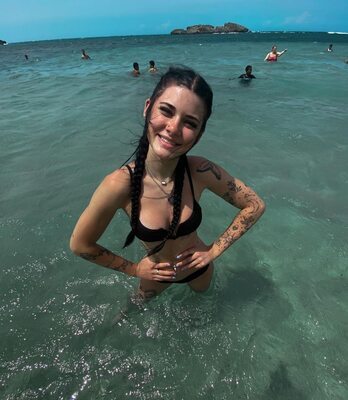 Picture tagged with: Skinny, Brunette, kendlebutterworth, Beach, Bikini, Braid, Cute, Smiling, Tattoo